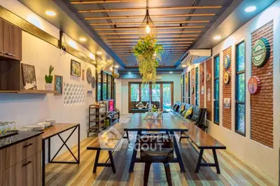 Stylish modern dining area with wooden accents and unique wall decor
