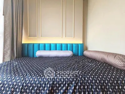 Stylish bedroom with modern decor and cozy bedding