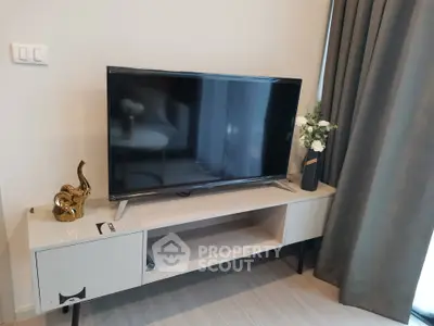 Modern living room with sleek TV stand and elegant decor