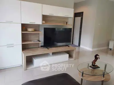 Modern living room with sleek entertainment center and stylish decor