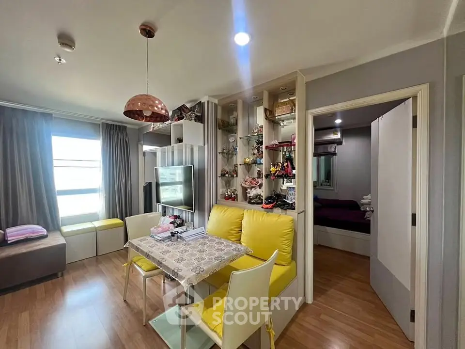 Charming living room with modern decor and cozy dining area