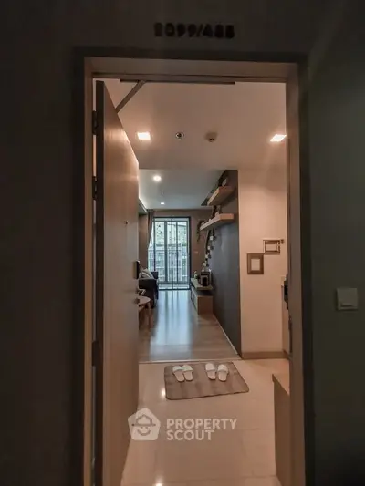 Modern apartment entrance with cozy interior and balcony view
