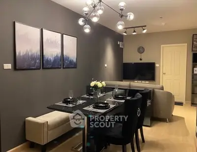 Modern living room with elegant dining area and stylish decor
