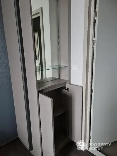 Modern storage cabinet with mirror in sleek apartment interior