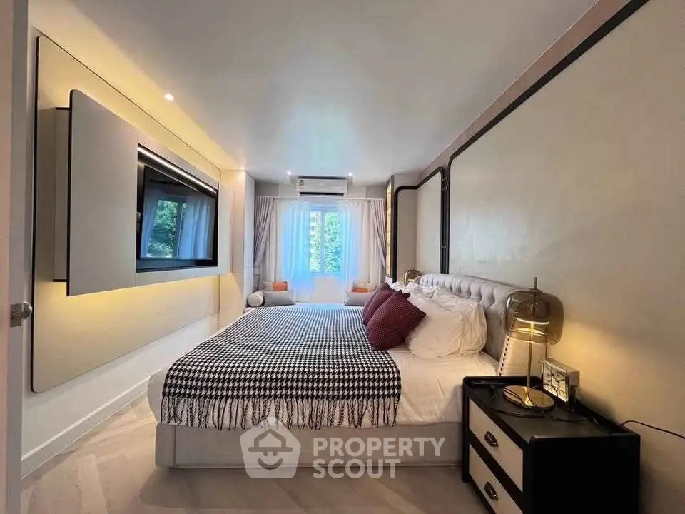 Luxurious modern bedroom with stylish decor and natural light