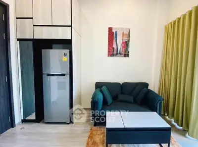 Modern living room with sleek furniture and stylish decor in a contemporary apartment.