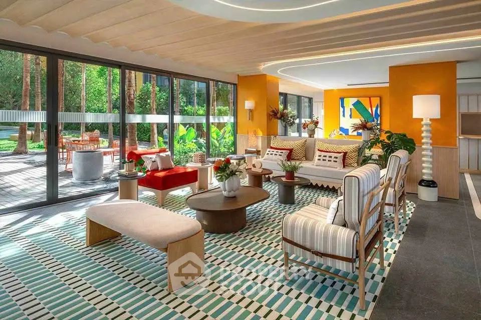 Luxurious living room with modern decor and large windows overlooking a lush garden.