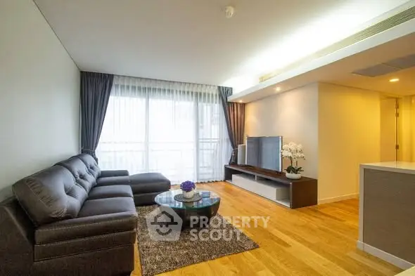 Spacious modern living room with elegant decor and natural light