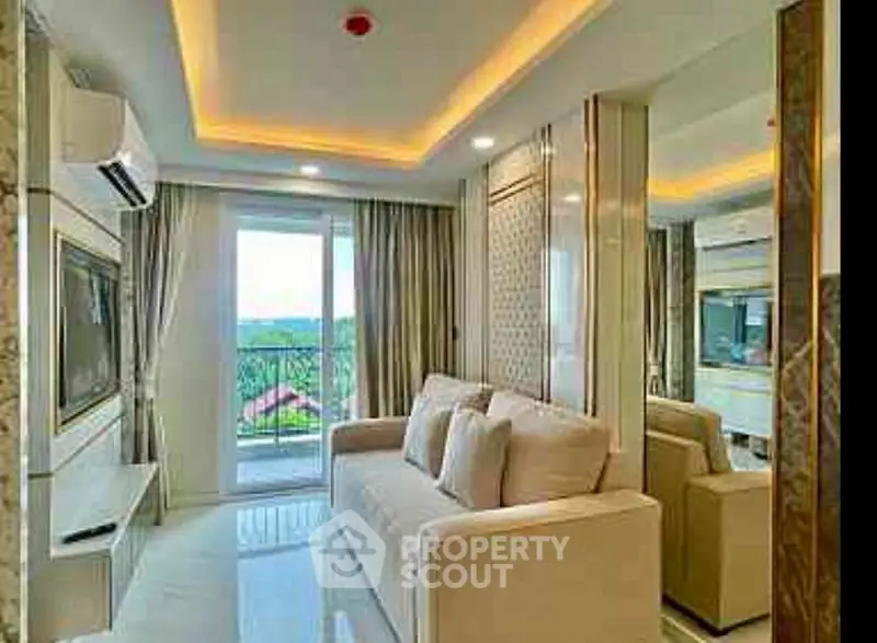 Luxurious living room with modern decor and balcony view