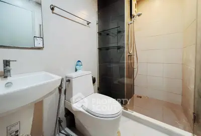 Modern bathroom with sleek shower and contemporary fixtures