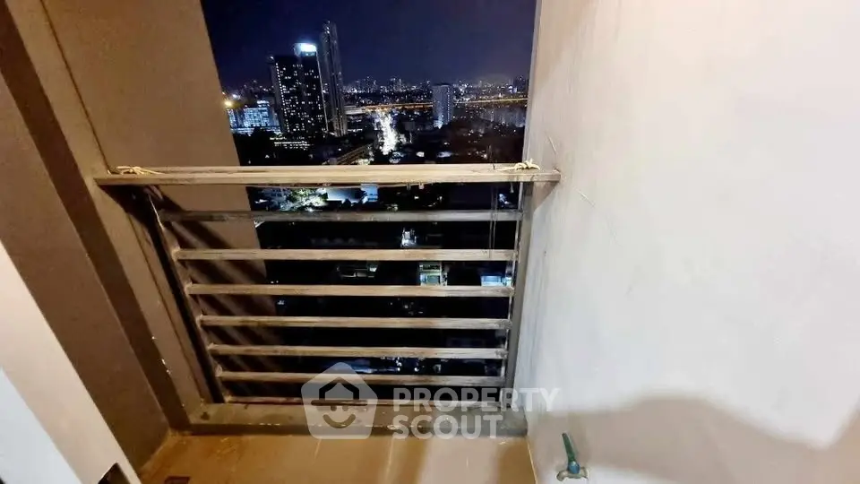 Stunning night cityscape view from a high-rise balcony, perfect for urban living enthusiasts.
