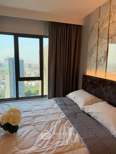 Luxurious bedroom with stunning city view and elegant decor