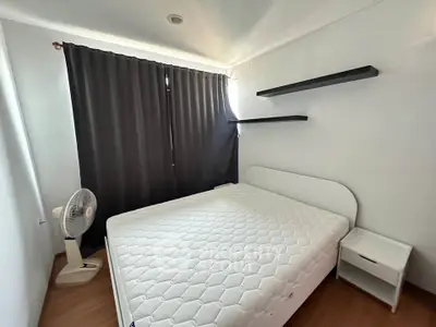 Cozy bedroom with minimalist design and natural light
