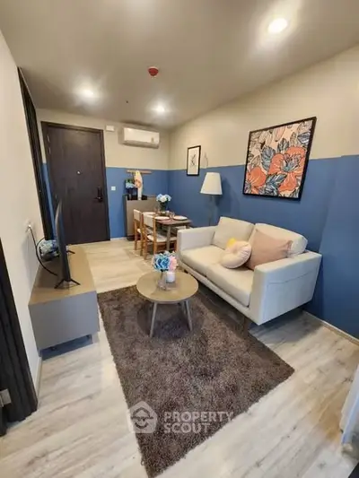 Modern living room with stylish decor and cozy seating area