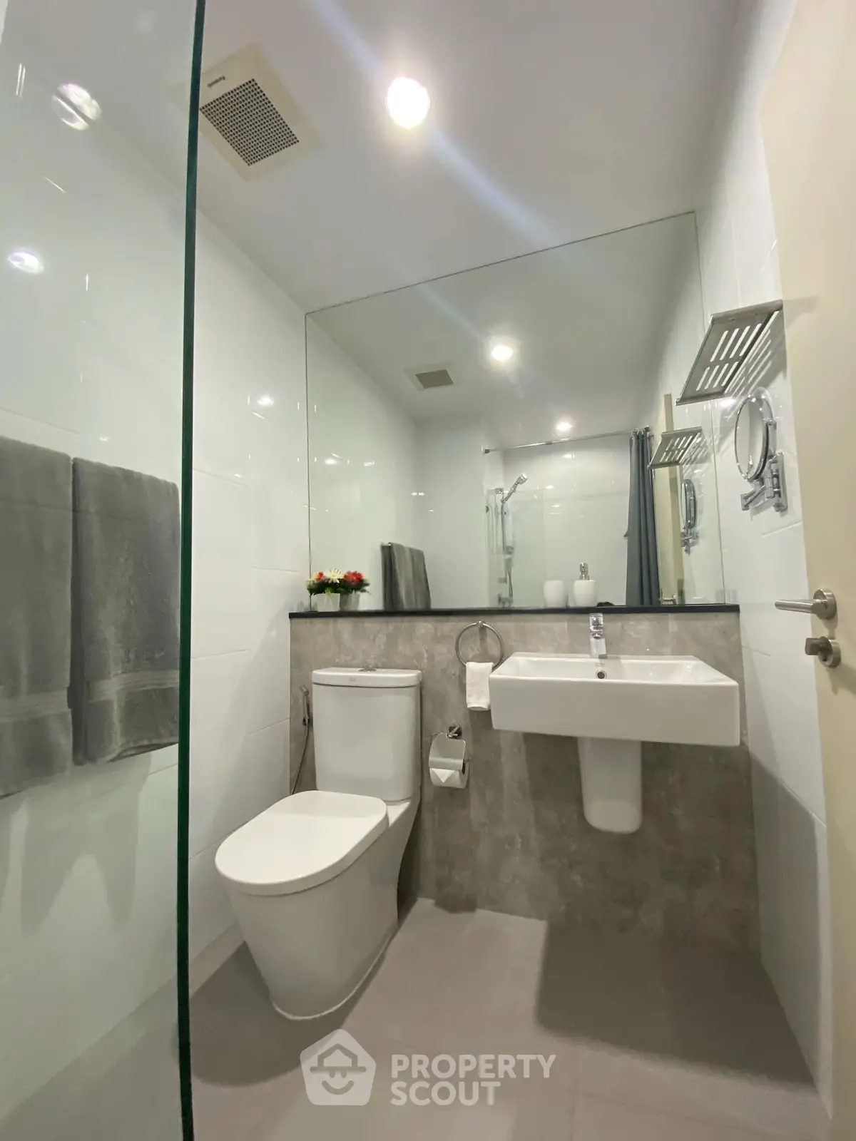 Modern bathroom with sleek design and glass shower enclosure