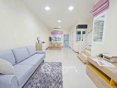 Spacious modern living room with stylish decor and natural light