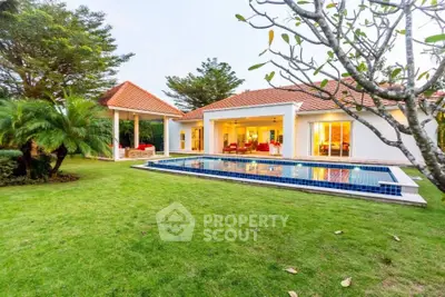 Luxurious villa with private pool and lush garden, perfect for serene living.