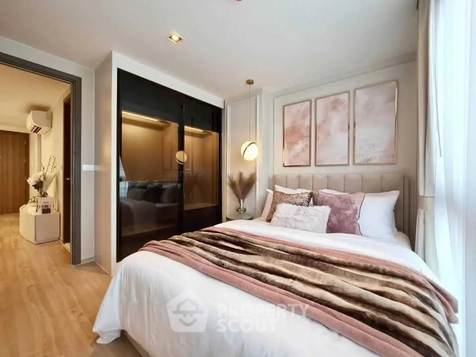 Luxurious bedroom with elegant decor and plush bedding in modern apartment