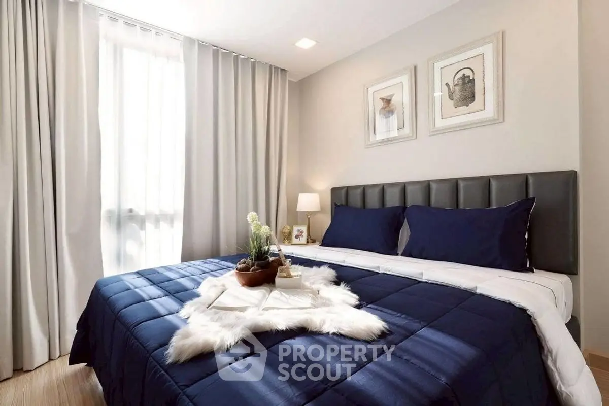 Cozy and elegant bedroom with plush bedding and stylish decor, perfect for relaxation.