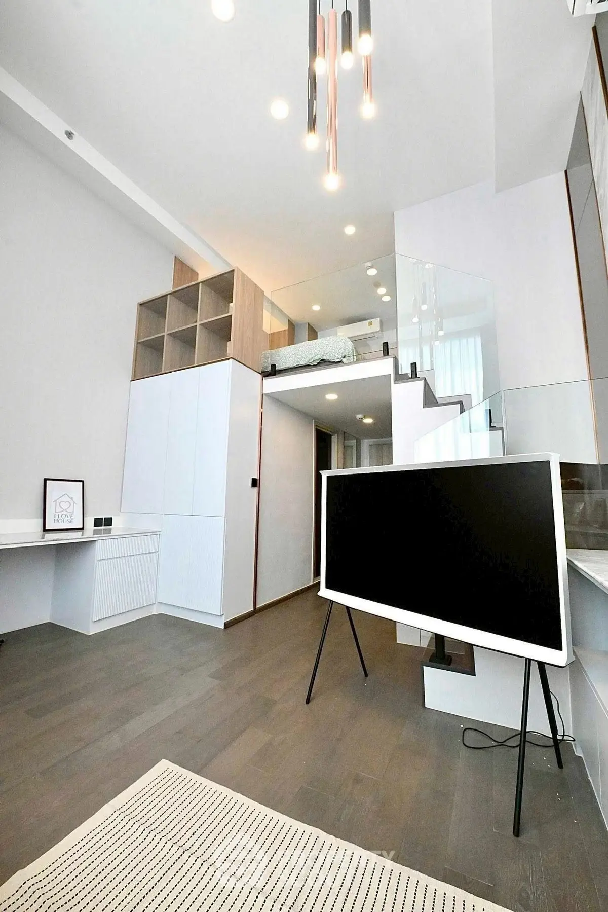 Modern loft-style living room with sleek design and high ceilings