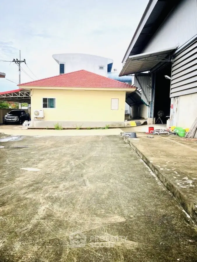 Spacious industrial property with ample parking and modern facilities.