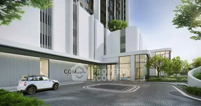 Modern building exterior with sleek design and lush greenery