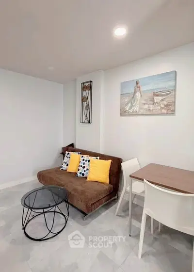 Cozy living room with modern decor and stylish furniture, perfect for relaxation and entertaining.