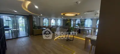 Spacious modern living room with elegant lighting and stylish furniture