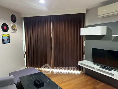 Modern living room with stylish decor and entertainment setup