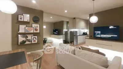 Modern living room with stylish decor and open kitchen layout
