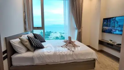 Luxurious bedroom with stunning ocean view and modern decor