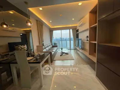 Luxurious modern living room with stunning city view and elegant interior design.