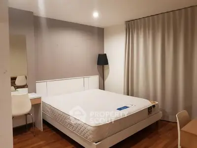 Modern bedroom with minimalist design and cozy ambiance