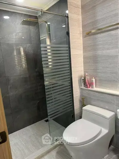 Modern bathroom with glass shower and sleek design