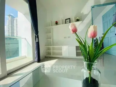 Bright modern living room with balcony view and elegant decor