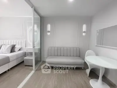 Modern minimalist bedroom with sleek furniture and elegant decor