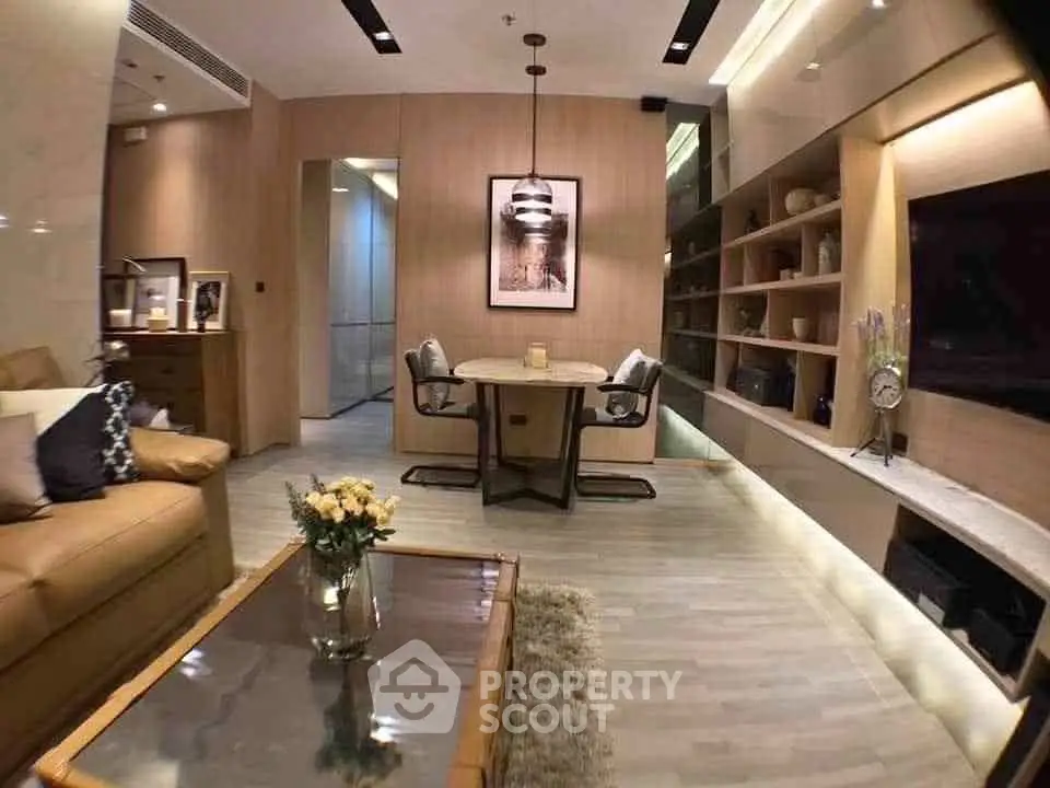 Luxurious modern living room with elegant decor and cozy seating area.