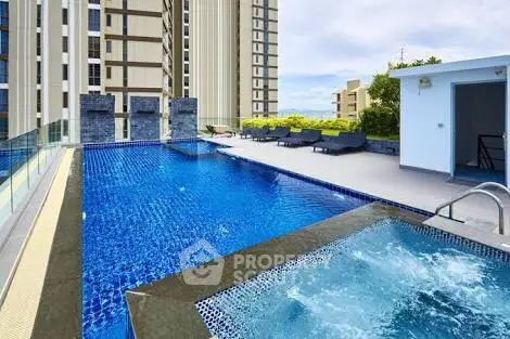 Luxurious rooftop pool with stunning city views in modern high-rise building
