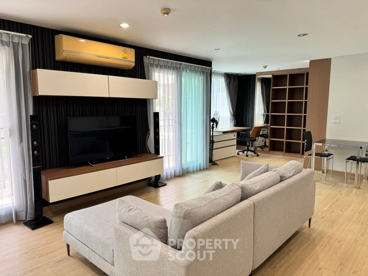 Spacious modern living room with stylish furniture and natural light