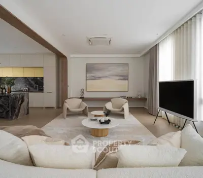 Luxurious modern living room with elegant decor and open kitchen layout