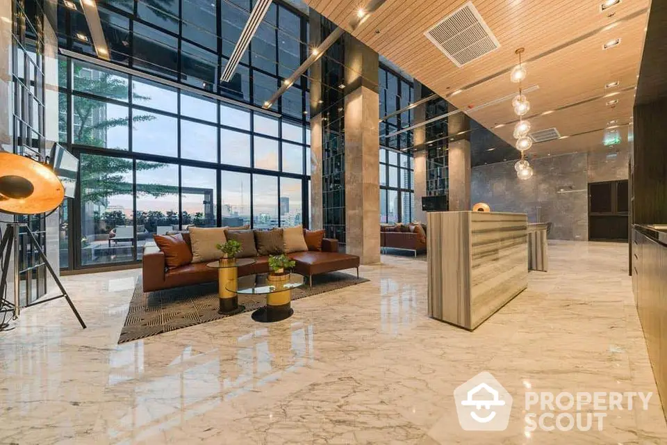 Luxurious modern lobby with marble flooring and panoramic city views