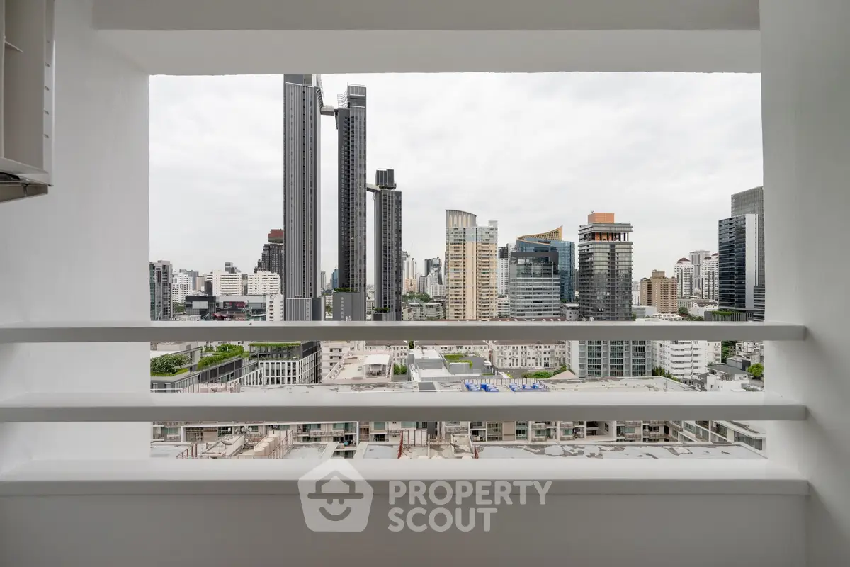 Stunning cityscape view from modern balcony in high-rise apartment