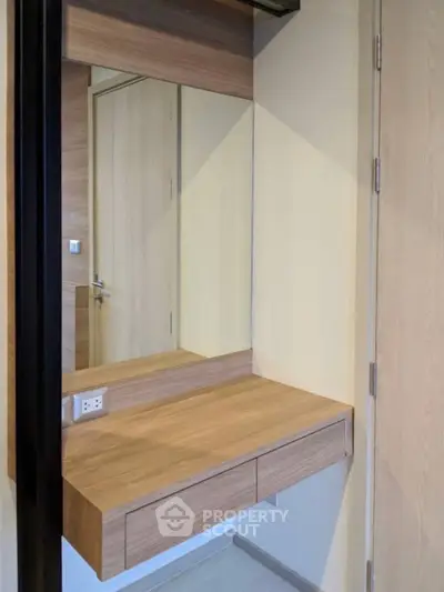 Modern minimalist wooden vanity with mirror in compact space