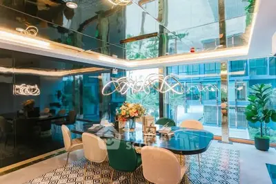 Luxurious modern dining area with elegant lighting and stylish decor