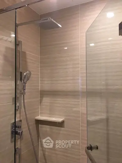 Modern bathroom with sleek shower design and glass enclosure