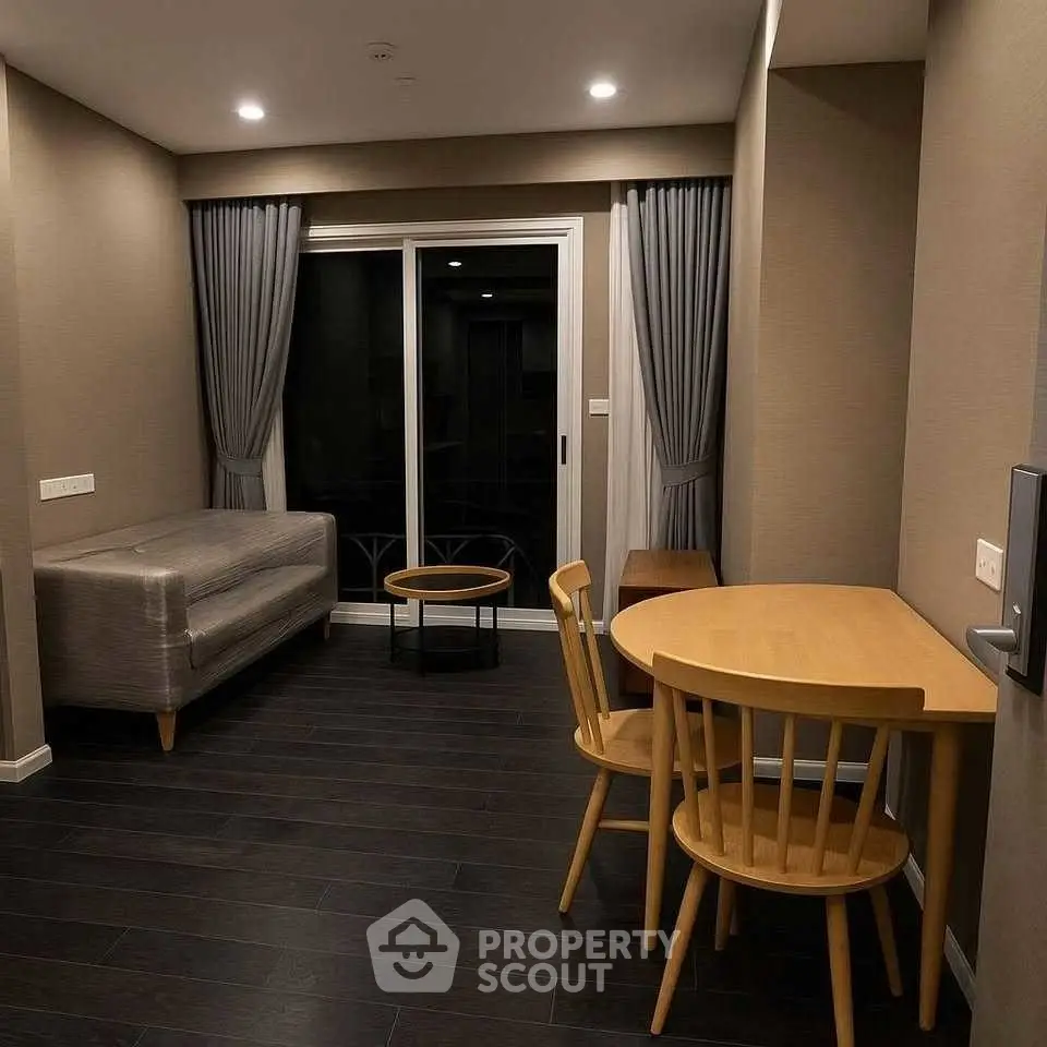 Cozy living room with modern furniture and dark wood flooring