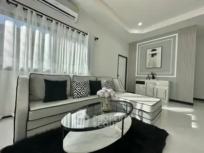 Luxurious modern living room with elegant decor and natural light