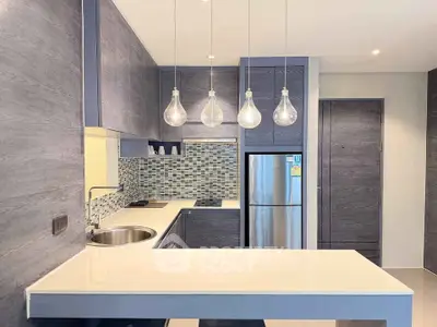 Modern kitchen with sleek design and stainless steel appliances