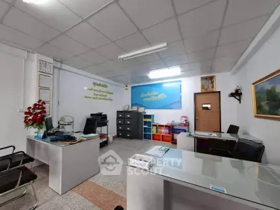 Spacious office interior with modern furniture and organized layout