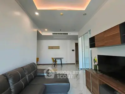 Modern living room with sleek furniture and elegant lighting